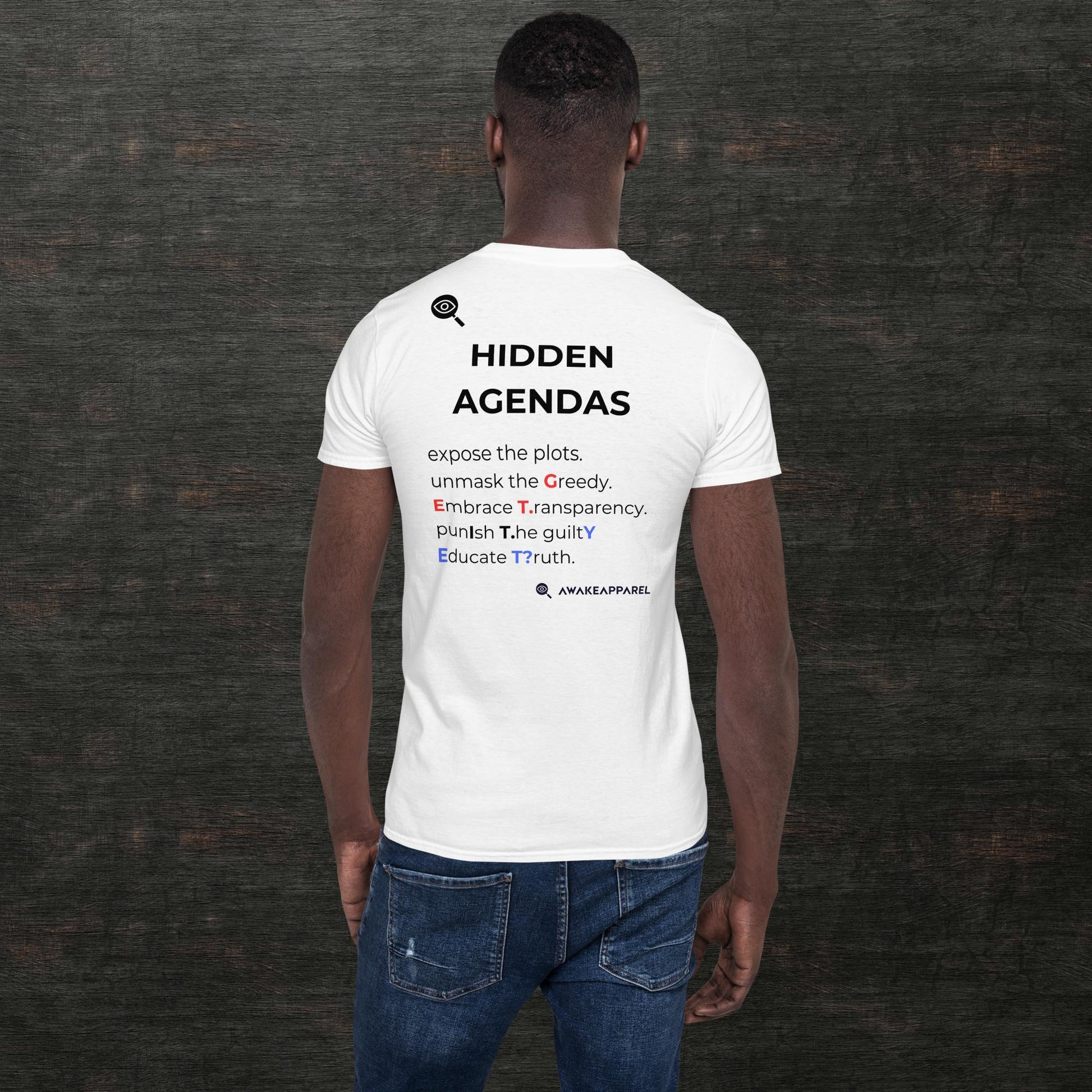 Back of White Cornerstone Essential T-shirt - 'Expose the plots. Unmask the Greedy. Embrace Transparency. Punish The Guilty. Educate Truth.' with AwakeApparel Logo