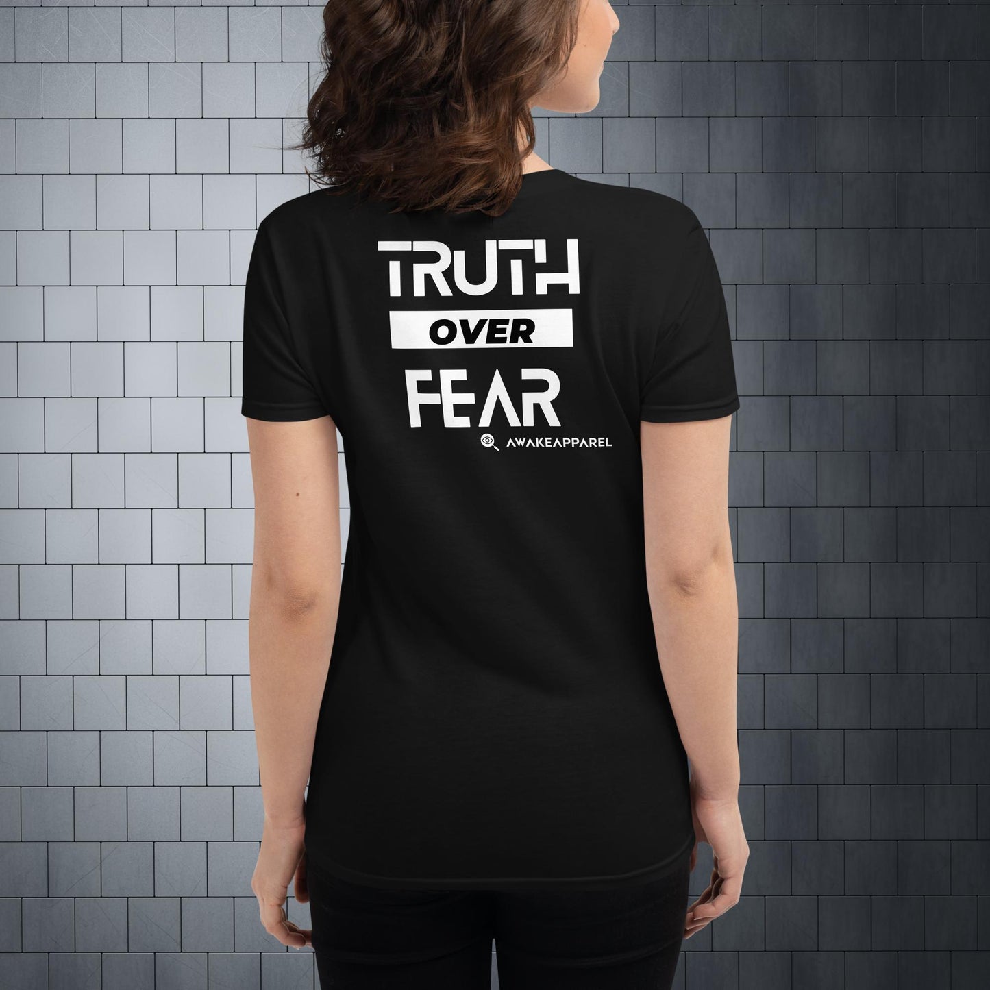 Back of Black Conscious Comfort Women's T-Shirt - 'Truth over Fear' with AwakeApparel Logo