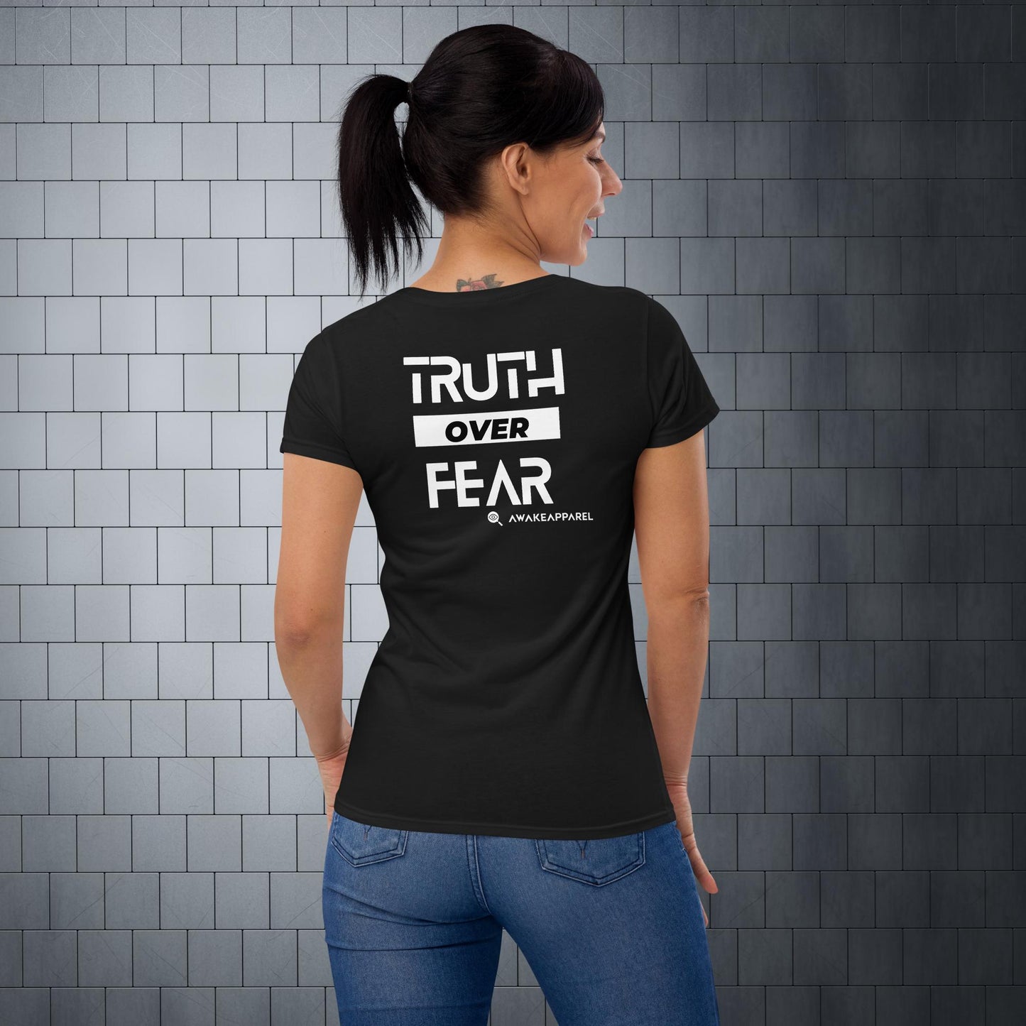 Back of Black Conscious Comfort Women's T-Shirt - 'Truth over Fear' with AwakeApparel Logo