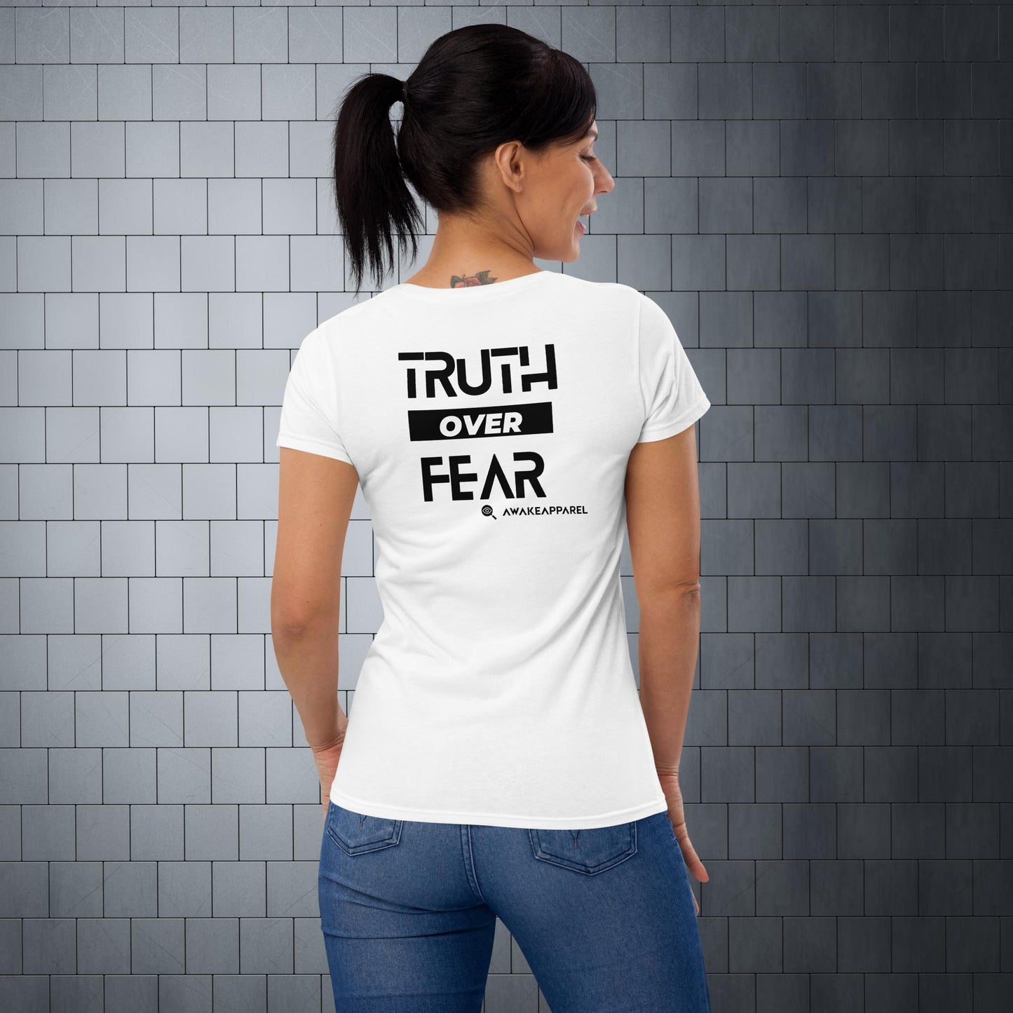 Back of White Conscious Comfort Women's T-Shirt - 'Truth over Fear' with AwakeApparel Logo